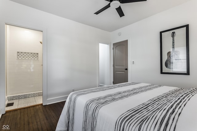 1210 Finley Ave, Indianapolis, IN 46203 - bedroom with dark wood finished floors, baseboards, connected bathroom, and ceiling fan