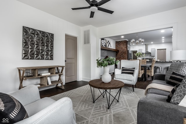 1210 Finley Ave, Indianapolis, IN 46203 - living room featuring a chandelier, a ceiling fan, wood finished floors, and recessed lighting