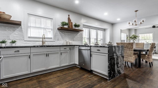 1210 Finley Ave, Indianapolis, IN 46203 - kitchen with dishwasher, open shelves, a sink, a peninsula, and dark wood finished floors