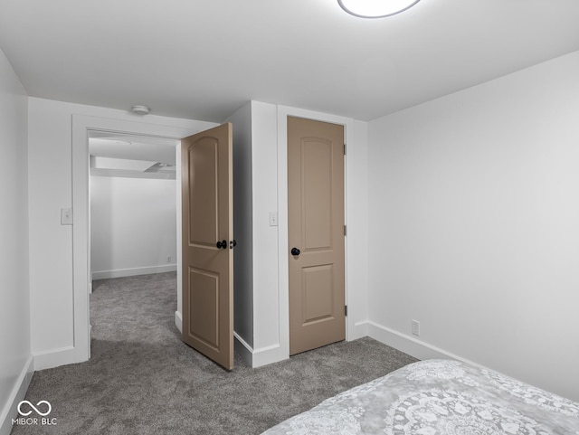 1210 Finley Ave, Indianapolis, IN 46203 - unfurnished bedroom with carpet and baseboards