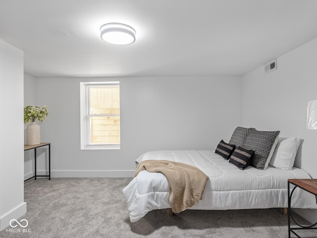 1210 Finley Ave, Indianapolis, IN 46203 - carpeted bedroom with baseboards