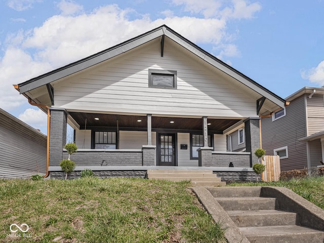 1210 Finley Ave, Indianapolis, IN 46203 - view of front of property featuring a porch