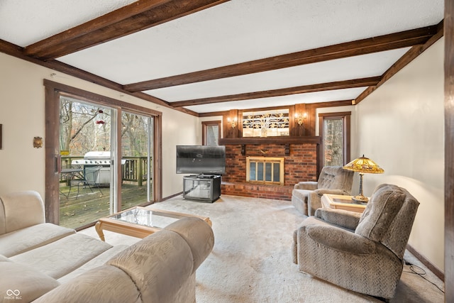 living room featuring carpet flooring, a brick fireplace, and beamed ceiling