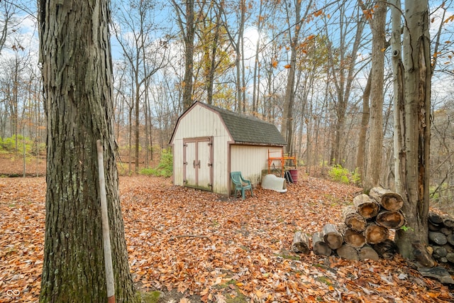 exterior space with a shed