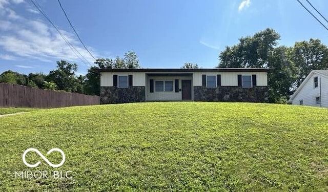 ranch-style house with a front yard