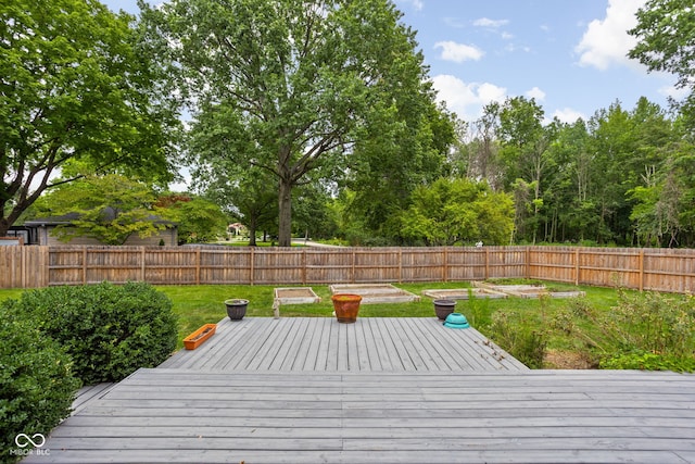 wooden deck with a yard