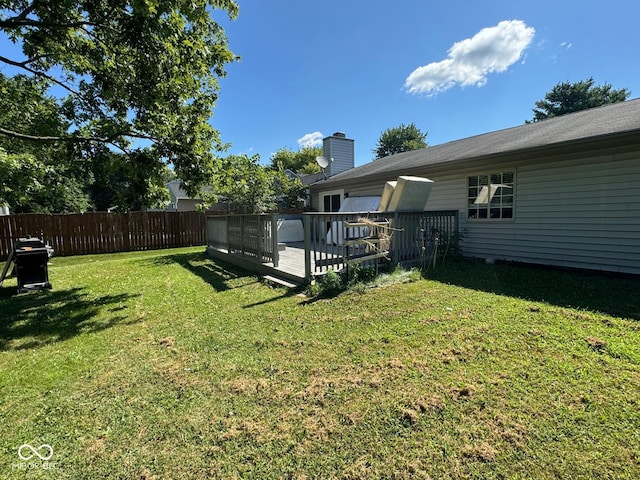 view of yard with a deck