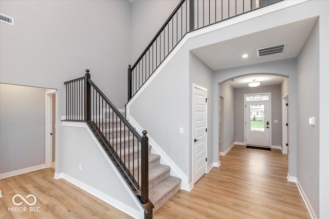 entrance foyer with light hardwood / wood-style flooring