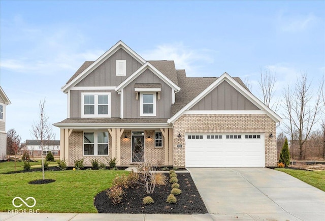 craftsman-style home with a garage and a front yard