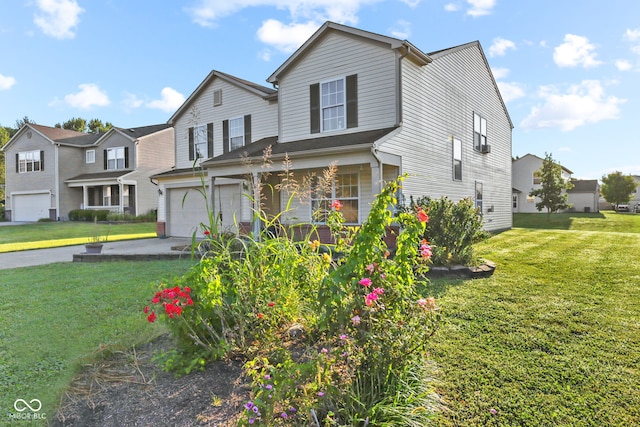 view of front of property featuring a garage and a front lawn