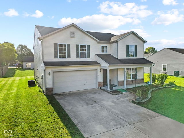 view of front property with a front lawn, central AC, and a garage