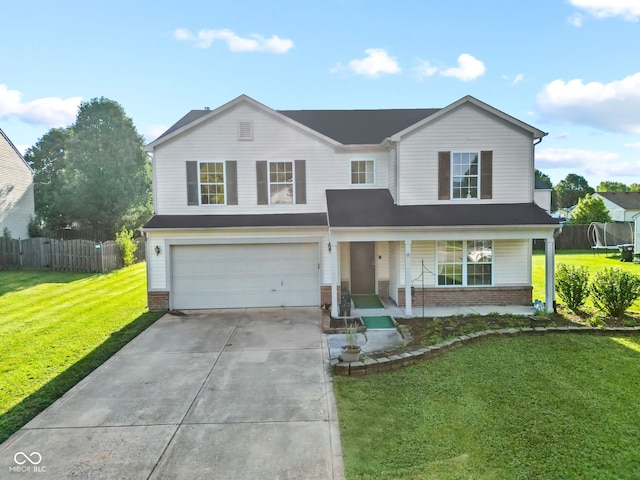 traditional home with a garage, concrete driveway, fence, a front lawn, and brick siding