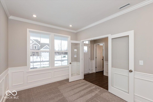 interior space featuring crown molding