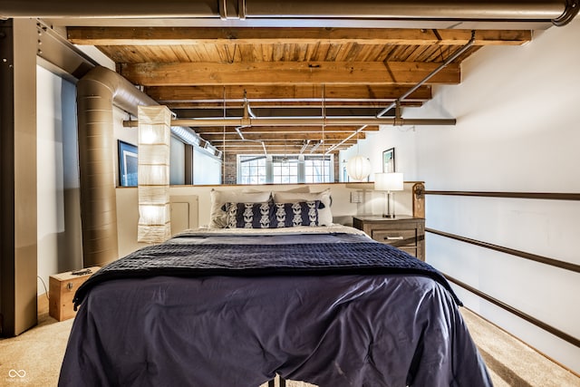 carpeted bedroom featuring wood ceiling and beamed ceiling