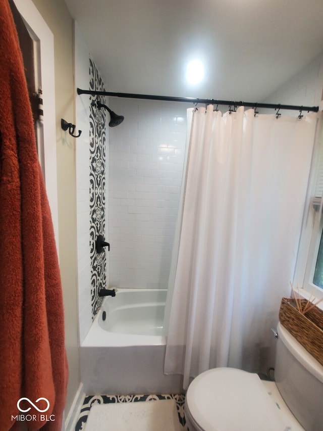 full bathroom with toilet and shower / bath combination with curtain