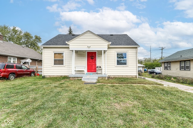 bungalow with a front lawn