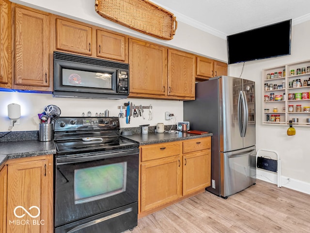 kitchen with black appliances, light hardwood / wood-style flooring, and ornamental molding