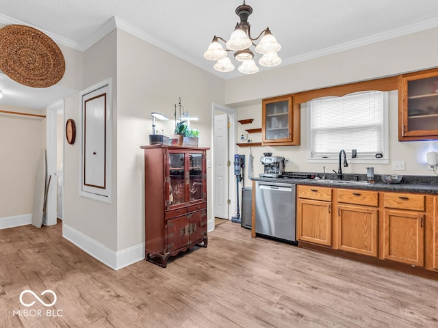 kitchen featuring sink, ornamental molding, light wood-type flooring, stainless steel dishwasher, and hanging light fixtures