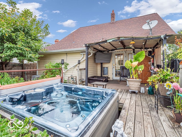 view of swimming pool with a deck