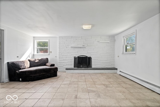 living room with a fireplace and a baseboard radiator