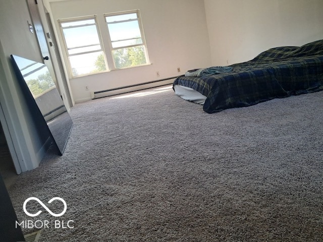 bedroom featuring carpet flooring and a baseboard radiator