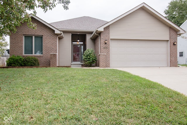 ranch-style house featuring a garage and a front yard