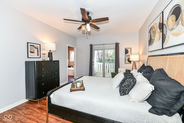 bedroom featuring ensuite bathroom, dark hardwood / wood-style floors, access to exterior, and ceiling fan