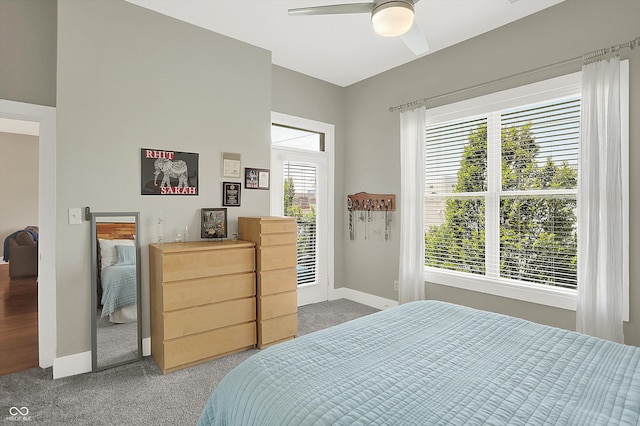 bedroom with ceiling fan and carpet