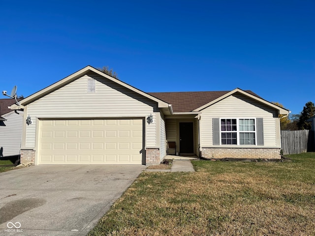 ranch-style home featuring a garage and a front lawn