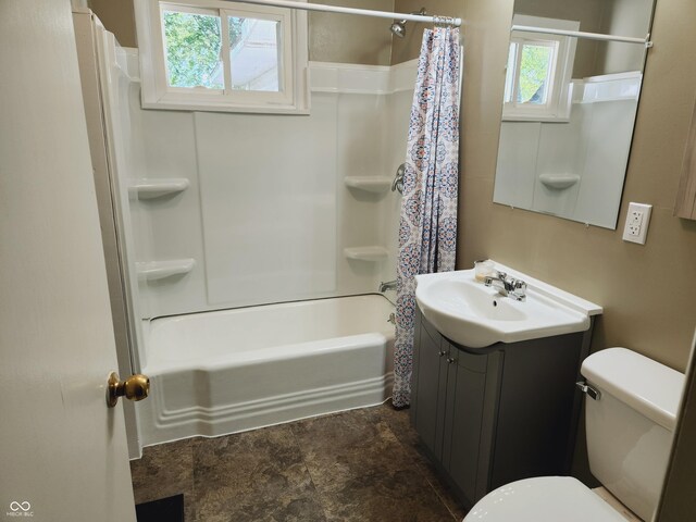 full bathroom with shower / bathtub combination with curtain, vanity, and toilet