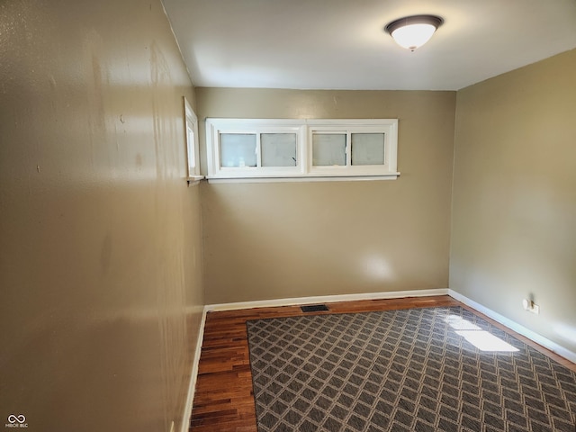 empty room featuring hardwood / wood-style floors