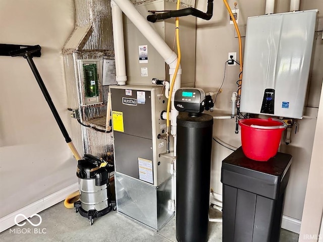 utility room featuring tankless water heater