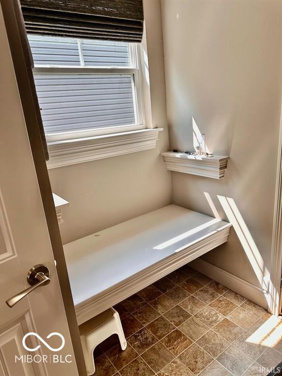 bathroom with tile patterned flooring