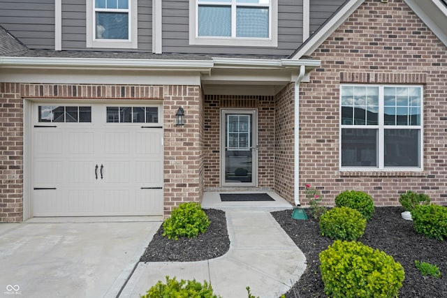 entrance to property featuring a garage