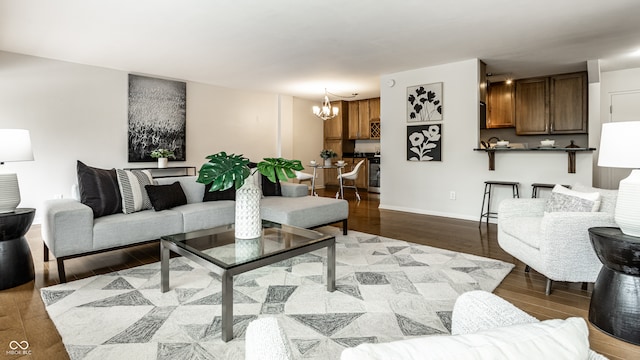 living room featuring light hardwood / wood-style floors and a chandelier