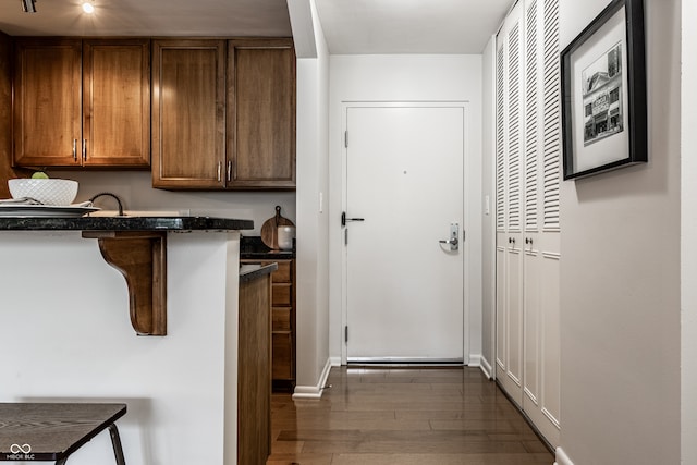 interior space with dark hardwood / wood-style flooring