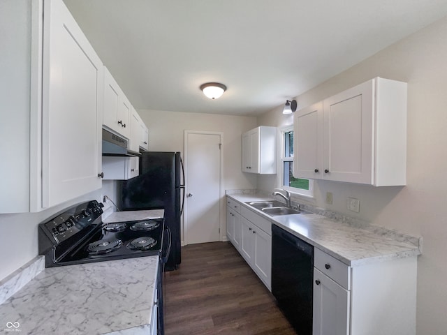 kitchen with black appliances, sink, dark wood-type flooring, and white cabinetry