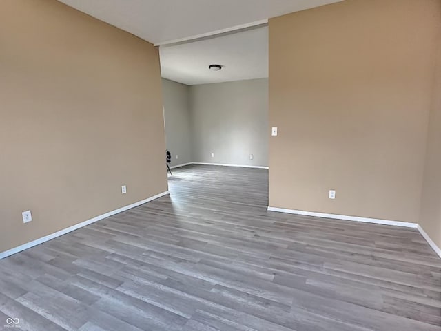 spare room featuring hardwood / wood-style floors