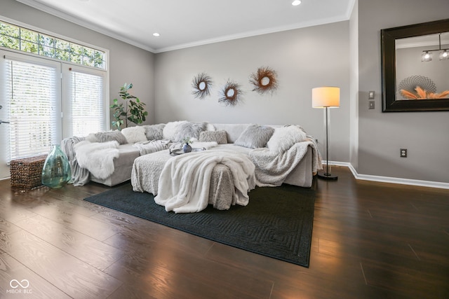 bedroom featuring crown molding and dark hardwood / wood-style flooring