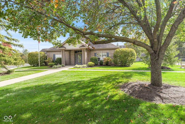 view of front of home with a front yard