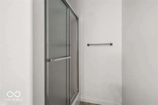 bathroom featuring walk in shower