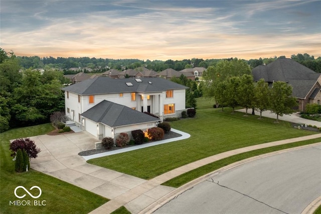 view of front of house with a yard