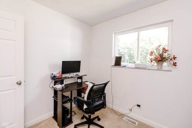 office area with light colored carpet