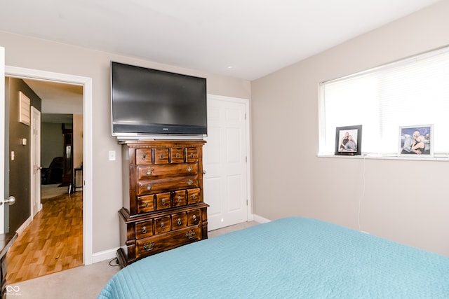 bedroom featuring hardwood / wood-style floors