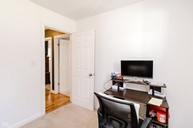 office area with light colored carpet