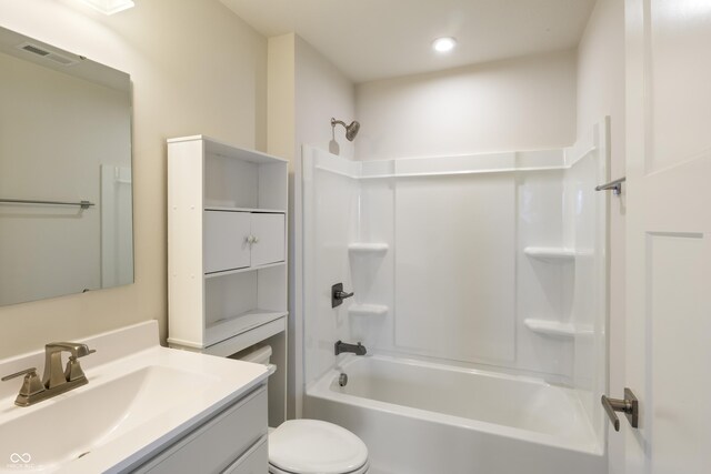 full bathroom with toilet, shower / bathing tub combination, and vanity