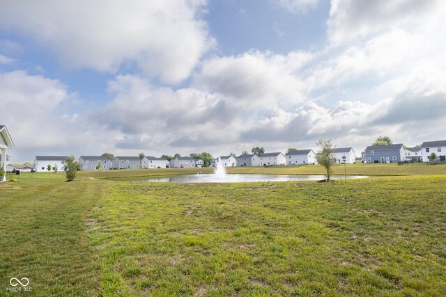 view of yard with a water view