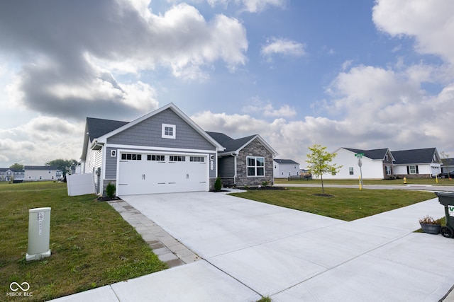 view of front facade featuring a garage and a front lawn