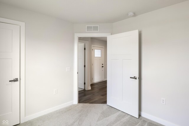 unfurnished bedroom featuring carpet floors