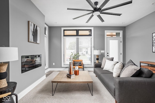 living room featuring ceiling fan